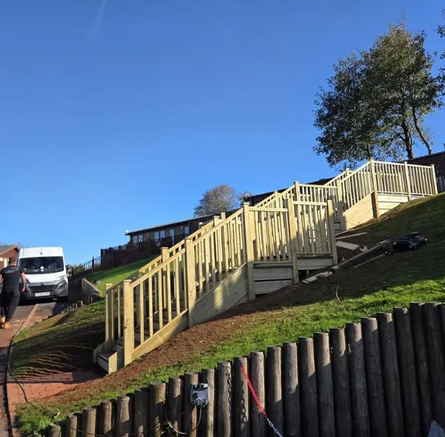 Tiered staircase and walkway decking on a slope in Topsham